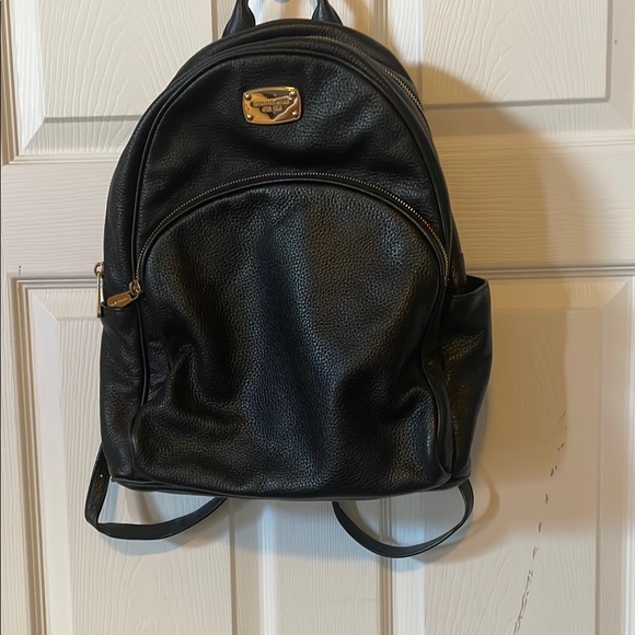 Michael Kors Handbags - Michael Kors Abbey black pebbled leather backpack with gold hardware